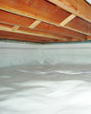 a moisture barrier installed on the walls and floors of a crawl space in Windsor