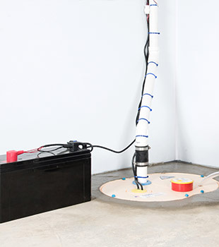 A sump pump installed in Trumansburg by Basement Systems