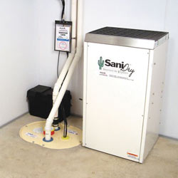 Sump pump system, dehumidifier, and basement wall panels installed during a sump pump installation in Greene