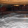 A sealed crawl space with support posts showing in Vestal.