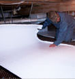 Horseheads insulation being installed in a crawl space.