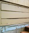 an old-fashioned crawl space door in Apalachin about to be replaced