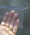 Closeup of a clear plastic covering on a Waverly crawl space block wall