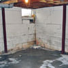 Rusted, corroded i-beams found with a failing foundation in a Owego home.