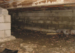 Rotting, decaying crawl space wood damaged over time in Greene