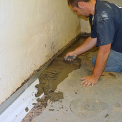 Testing a French drain system in a Waverly home.