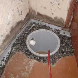 Installing a sump in a sump pump liner in a Elmira home