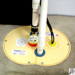 A sump pump system installed along a basement floor in Binghamton.