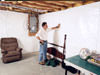 A basement wall covering for creating a vapor barrier on basement walls in Walton
