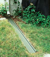A recessed gutter drain extension installed in Unadilla, New York