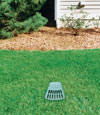 A buried gutter drain downspout extension installed in a Unadilla home