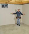 Horseheads basement insulation covered by EverLast™ wall paneling, with SilverGlo™ insulation underneath