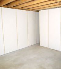 Unfinished basement insulated wall covering in Lansing, New York