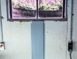 Repaired waterproofed basement window leak in Johnson City